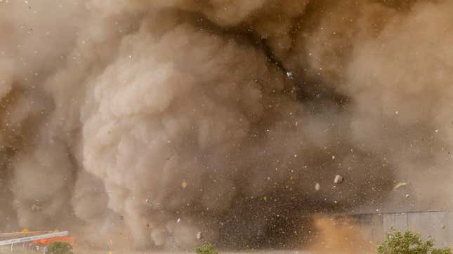 Rocks and other debris fly around remote cameras as SpaceX’s next-generation Starship spacecraft atop the Super Heavy rocket lifts off from the company’s Boca Chica launchpad on an uncrewed test flight before exploding near Brownsville, Texas, U.S. April 20, 2023. 