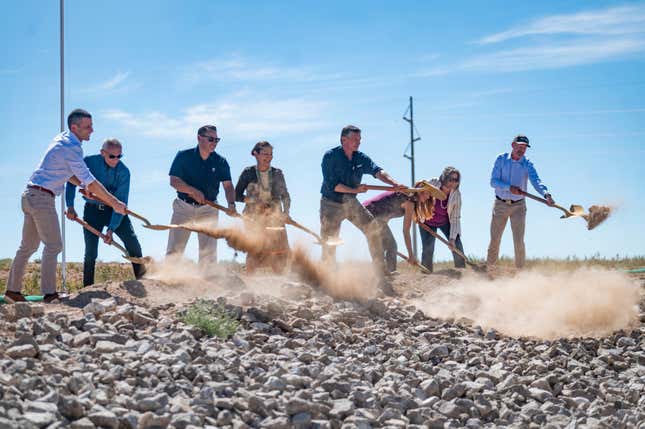 FILE - Dignitaries, including U.S. Secretary of the Interior Deb Haaland, center, break ground on the new SunZia transmission line project, Sept. 1, 2023, in Corona, N.M. A federal judge on Tuesday, April 16, 2024, rejected a request by Native American tribes and environmentalists to stop work on the $10 billion transmission line being built through a remote southeastern Arizona valley that will carry wind-generated electricity from New Mexico to customers as far away as California. (Jon Austria/The Albuquerque Journal via AP, File)