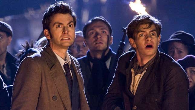 David Tennant's 10th Doctor and Andrew Garfield as Frank in the Doctor Who episode "Evolution of the Daleks," looking up in horror at night at something off screen.