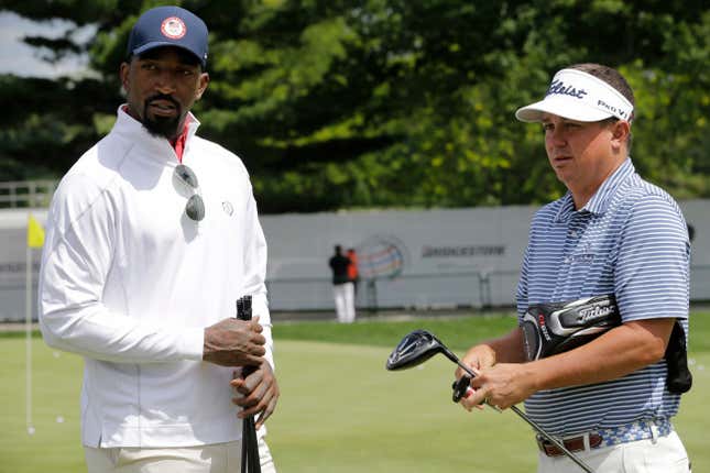 Cleveland Cavaliers’ J.R. Smith, left, talks with Jason Dufner during the practice round of the Bridgestone Invitational golf tournament at Firestone Country Club, Wednesday, June 29, 2016, in Akron, Ohio. 