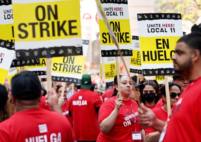 Hotel workers with Unite Here Local 11 picket outside the InterContinental hotel on the first day of a strike by union members at many major hotels in Southern California on July 2, 2023 in Los Angeles, California. The union represents nearly 15,000 workers from 65 major hotels in Los Angeles and Orange Counties who are calling for higher pay and increased benefits. Affected hotels are currently remaining open with management and nonunion staff attempting to fill in during the strike ahead of the 4th of July holiday.