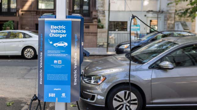 A curbside PlugNYC electric vehicle (EV) charger near West 76th Street in New York, US, on Wednesday, Aug. 31, 2022. As electric-car adoption picks up across the US, more cities can expect to see gas station deforestation.’