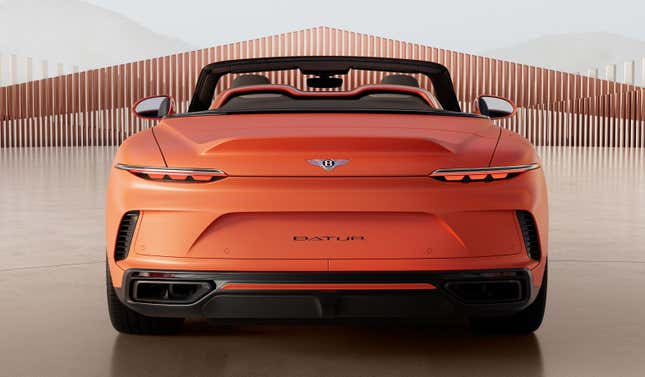 Rear view of an orange Bentley Batur convertible