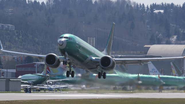 A photo of a Boeing 737 Max taking off for a test flight. 