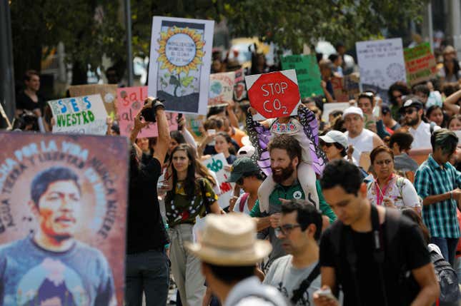 People take part during a Global Climate Strike rally in Mexico City, Mexico on Sept 20.