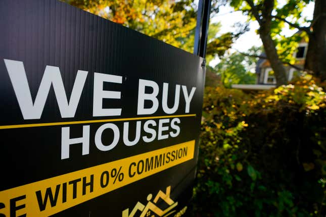 FILE - A sign is seen near a home being remodeled, Wednesday, Oct. 12, 2022, in Towson, Md. Homebuyers who can afford to bypass the highest mortgage rates in two decades are increasingly forgoing financing and paying all cash. Homes purchased entirely with cash accounted for 34.1% of all sales in September, up from 29.5% a year earlier. (AP Photo/Julio Cortez, File)