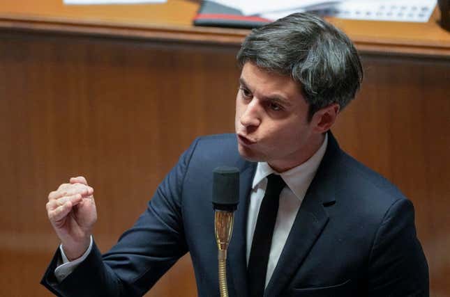 FILE - French Prime Minister Gabriel Attal gestures as he speaks during the first session of questions to the new government at the National Assembly in Paris, Tuesday, Jan. 16, 2024. The French government said Monday, March 11, 2024 that several of its services are being targeted by cyberattacks of ‘’unprecedented intensity,’’ and a special crisis center was activated to restore online services. In a statement, Prime Minister Gabriel Attal’s office said the attacks started Sunday night and hit multiple government ministries, without providing details. (AP Photo/Michel Euler, File)