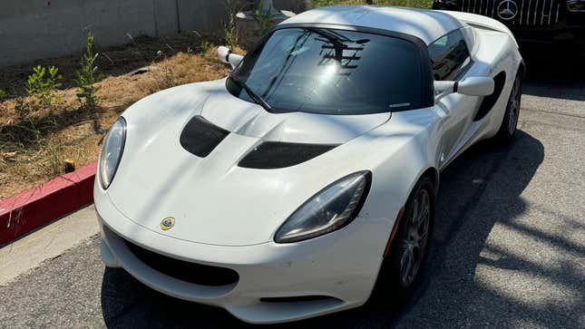 Front 3/4 view of a white 2011 Lotus Elise SC