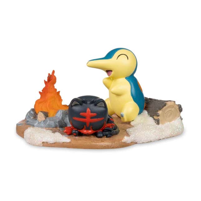 Figure of Cyndaquil sitting by a fire