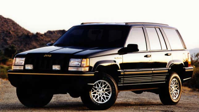 A photo of a black Jeep Cherokee with old trim. 