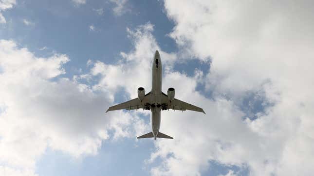 An American Airlines Boeing 787-9 Dreamliner approaches for a landing at the Miami International Airport on December 10, 2021 in Miami, Florida. The American Airlines company announced it will discontinue service to several international destinations in 2022 amid the ongoing shortage of Boeing 787 aircraft. 