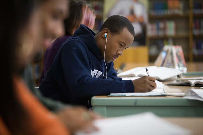 Black student writing 