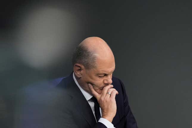 FILE - German Chancellor Olaf Scholz attends a debate fter his speech at the parliament Bundestag in Berlin, Germany, on Oct. 19, 2023. Chancellor Olaf Scholz says Germany needs to start deporting “on a large scale” migrants who don’t have the right to stay in the country, adding to increasingly tough talk on migration since his coalition performed badly in two state elections earlier this month. Scholz’s comments were published Friday, Oct. 20, 2021, as a leading German opposition figure called for the center-left chancellor to dump his quarrelsome coalition partners and instead form a government with conservatives to deal with migration issues. (AP Photo/Markus Schreiber)