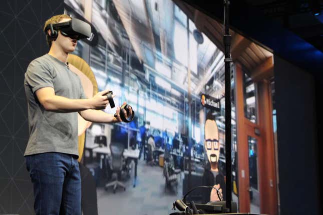 Mark Zuckerberg wears a virtual reality headset at a developers conference in 2016.