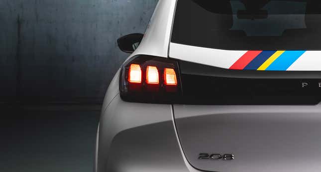 Taillight detail of a white Peugeot 208 Rallye