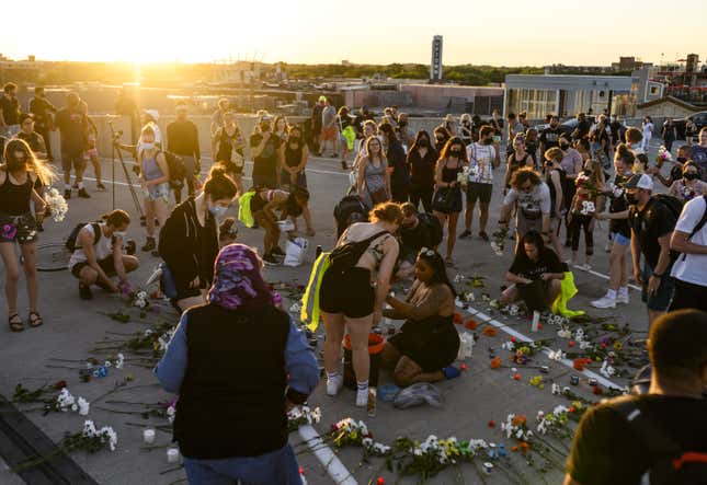 People gather for a vigil at the site where Winston Boogie Smith was killed on June 4, 2021 in Minneapolis, Minnesota. Smith was shot and killed yesterday during an altercation with law enforcement involving multiple agencies. Smith’s family is demanding clarity in the case as authorities claim there is no video available from the incident. 
