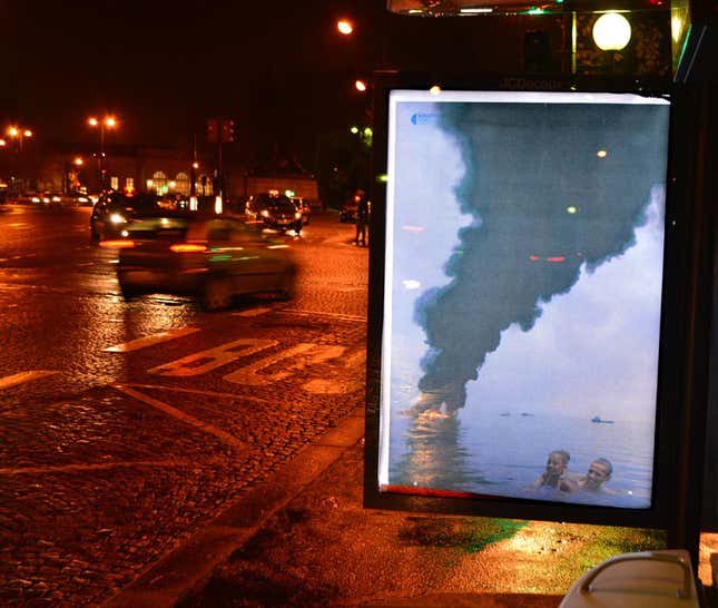 Image for article titled Photos: These subversive ads rip into the corporate sponsors of the Paris climate talks