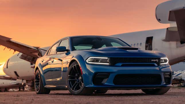 A photo of a blue Dodge Charger Hellcat muscle car. 