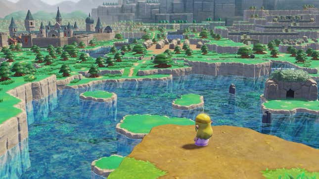 Zelda, standing on a rocky outcropping over a lake, looks toward a castle in the distance.