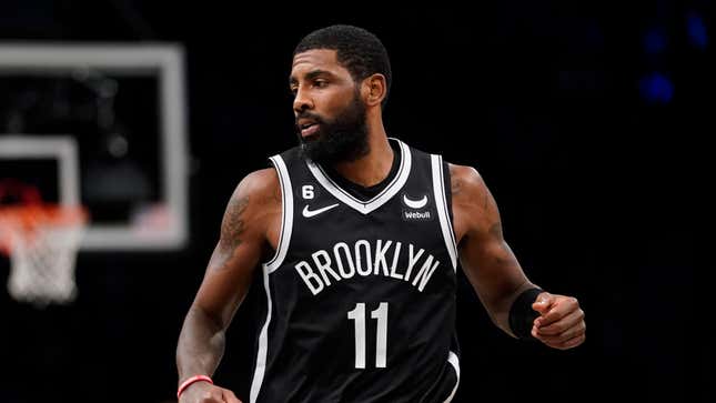 Brooklyn Nets guard Kyrie Irving (11) runs up the court during the first half of an NBA basketball game against the Dallas Mavericks, Thursday, Oct. 27, 2022, in New York. (AP Photo/John Minchillo)