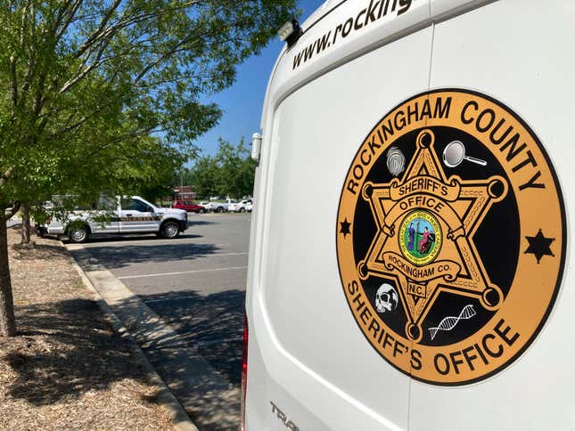 A crime scene unit van sits outside the Rockingham County Sheriff’s Department in Wentworth, N.C., on Saturday, July 23, 2022.