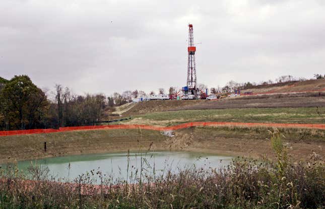 FILE – In this Oct. 29, 2008, file photo, a drilling rig used to extract natural gas from the Marcellus Shale, located on a hill above a pond on John Dunn&#39;s farm in the Washington County borough of Houston, Pa. The state of Pennsylvania will work with a major natural gas producer to collect in-depth data on air emissions and water quality at well sites, enhance public disclosure of drilling chemicals and expand buffer zones, officials announced Thursday, Nov. 2, 2023, touting the collaboration as the first of its kind. (AP Photo/Keith Srakocic, File)