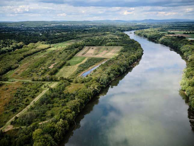 aerial view of the potomac river running between lush green land