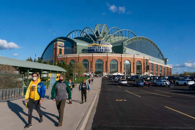 FILE - Fans are pictured outside American Family Field before a baseball game between the Milwaukee Brewers and the Chicago Cubs, April 12, 2021, in Milwaukee. Proposals for new and improved sports stadiums are proliferating across the U.S. — and could come with a hefty price tag for taxpayers. (AP Photo/Morry Gash, File)