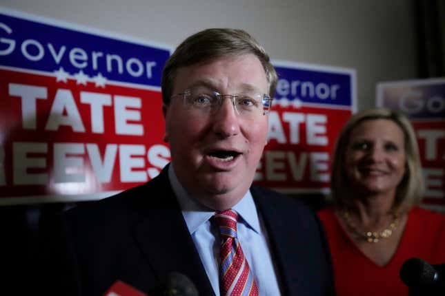 FILE - With wife Elee Reeves at his side, Mississippi Gov. Tate Reeves speaks in Jackson, Miss., after winning the Republican primary on Tuesday, Aug. 8, 2023. Records show Tate Reeves received a $10,000 campaign contribution from a shipping company executive in 2020, several days before the state announced incentives for a division of the company to expand its operation in Mississippi. (AP Photo/Rogelio V. Solis, File)