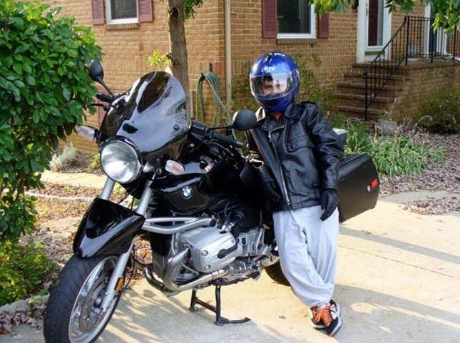 A 10-year-old me posing next to his Uncle Glenn’s BMW R1150R. It was a formative moment.