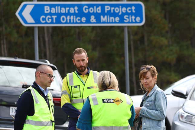 Worksafe Victoria representatives arrive for a press conference near Ballarat, Australia Thursday, March 14, 2024, after falling rocks inside a gold mine killed one worker and left another with life-threatening injuries. (Con Chronis/AAP Image via AP)