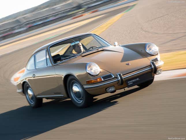 A camel beige 1964 Porsche 911 S on track.