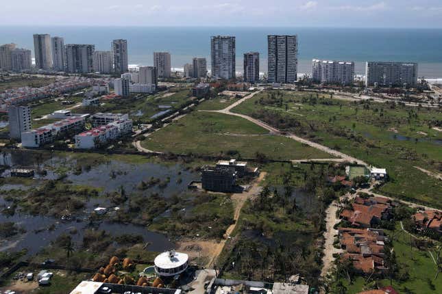 Hotels affected by Hurricane Otis stand battered two days after the passage of the Category 5 storm in Acapulco, Mexico Friday, Oct. 27, 2023. (AP Photo/Marco Ugarte)