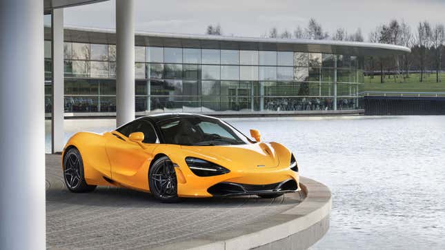 A photo of a McLaren 720S supercar at a lake. 