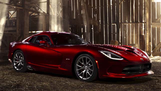 A photo of a red Dodge Viper sorts car. 