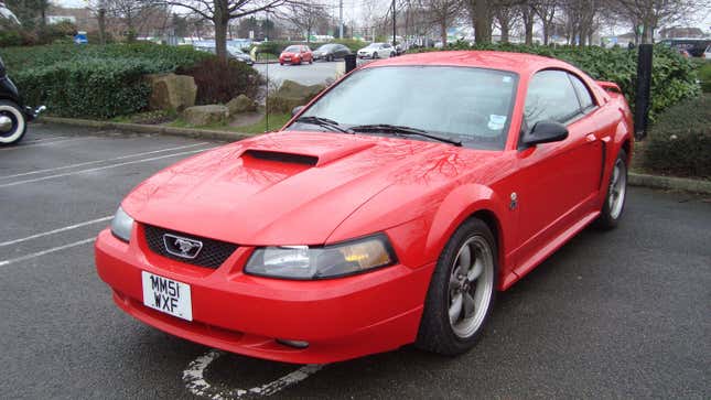 A red 2002 Ford Mustang 4.6 GT