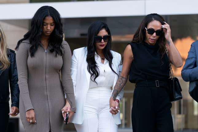 Vanessa Bryant, center, Kobe Bryant’s widow, leaves a federal courthouse with her daughter, Natalia, left, and soccer player Sydney Leroux in Los Angeles, Wednesday, Aug. 24, 2022. A federal jury has found that Los Angeles County must pay Bryant’s widow $16 million over photos of the NBA star’s body at the site of the 2020 helicopter crash that killed him.