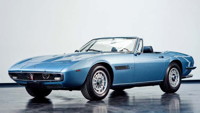 A photo of a blue Maserati Ghibli Spyder. 