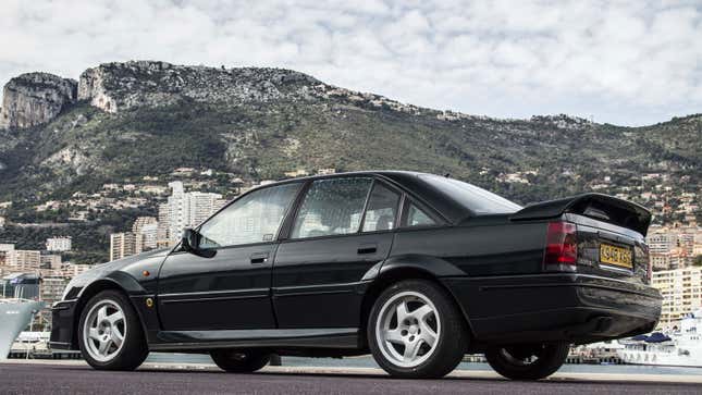 A photo of a black Lotus Carlton. 