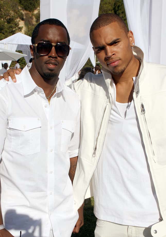 Sean “Diddy” Combs and singer Chris Brown attend the White Party hosted by Sean “Diddy” Combs and Ashton Kutcher to help raise awareness for Malaria No More held at a Private Residence on July 4, 2009 in Beverly Hills, California.