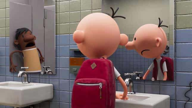 Diary of a Wimpy Kid's Greg washes his hands in the school bathroom while another boy screams in horror.