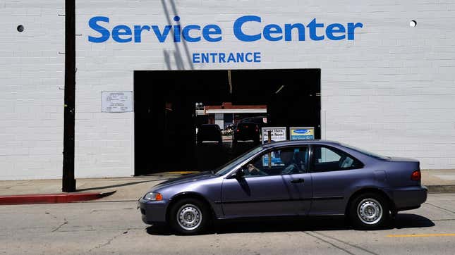 A Honda Civic drives past the service center of Honda of Hollywood dealership on August 5, 2011 in Los Angeles, California.