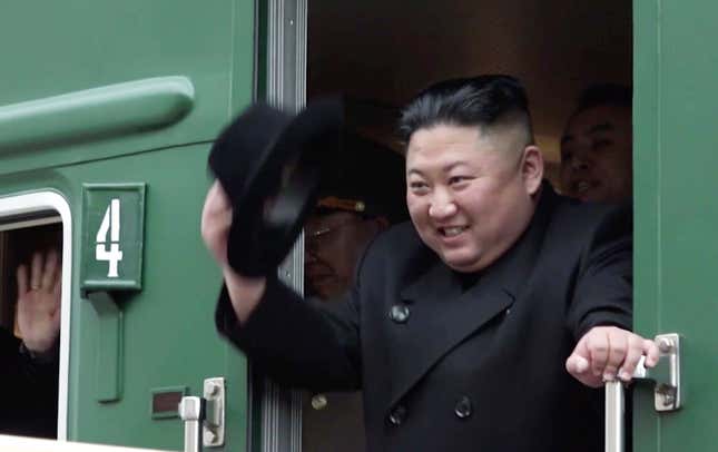 Kim Jong Un waves from his train as he leaves Khasan train station in Primorye region, Russia, April 24, 2019.