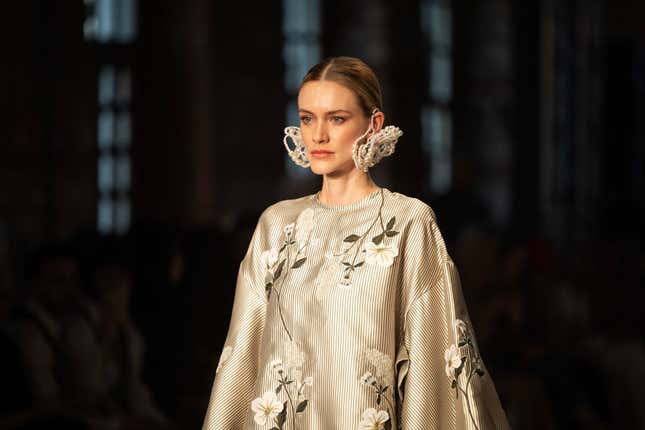 A model walks the runway in a design by Benang Jarum during Day 2 of Istanbul Modest Fashion Week 2024 at Fisekhane Gallery on April 26, 2024, in Istanbul, Turkey.