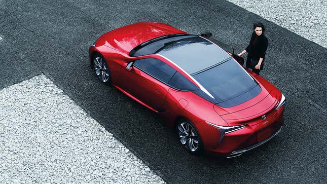 A red 2024 Lexus LC 500 parked and viewed from the rear quarter, overhead.