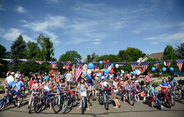 Participants wait for the start of the annual Fourth of July parade in The Greens neighborhood Friday morning, July 04, 2014. This was the 13th year for the parade according to organizer Jean Goldstein who participated in similar July Fourth celebrations organized by her father when she was growing up in Akron, Ohio. “It’s one of my favorite memories of all time,” she said. (Lewis Geyer/Times-Call) TO VIEW A SLIDESHOW VISIT WWW.TIMESCALL.COM (Photo by Lewis Geyer/Digital First Media/Boulder Daily Camera via Getty Images)