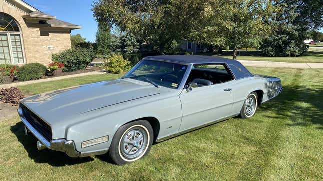 The '67 Thunderbird Apollo parked on a lawn in front of a home