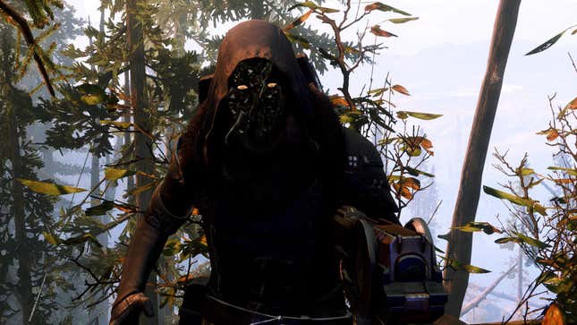 Xur stands among pine trees in Destiny 2's EDZ. 