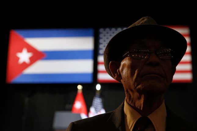 A man in a hat awaits to take his seat at the Gran Teatro de la Habana Alicia Alonso in Havana, Cuba, ahead of a speech by US president Barack Obama March 22, 2016.