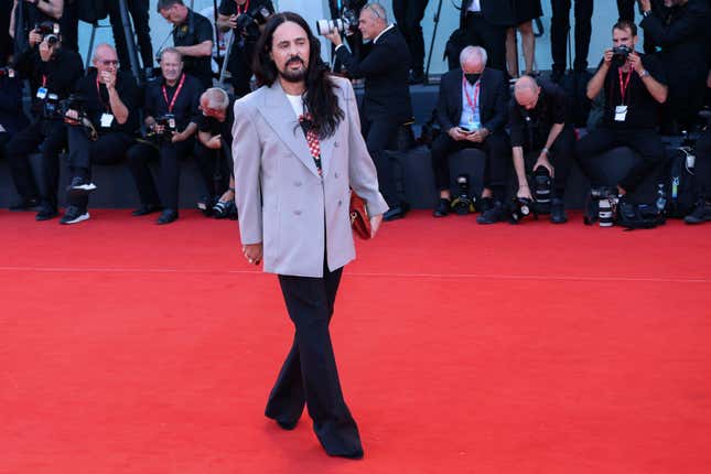 FILE - Alessandro Michele poses for photographers upon arrival at the premiere of the film &#39;Don&#39;t Worry Darling&#39; during the 79th edition of the Venice Film Festival in Venice, Italy, on Sept. 5, 2022. The flamboyant former designer of Gucci Alessandro Michele has been named the new creative director at storied Roman luxury house Valentino, following the sudden departure last week of Pierpaolo Piccioli after 25 years. Valentino confirmed the move in a statement Thursday March 28, 2024. (Photo by Joel C Ryan/Invision/AP, File)